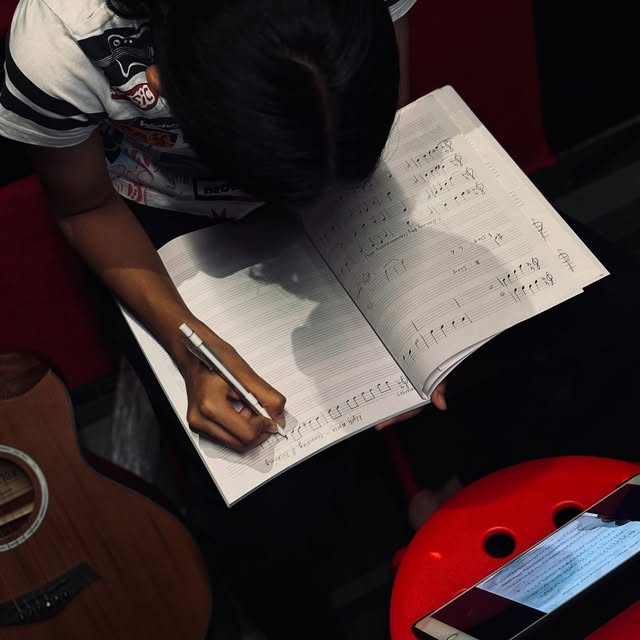 A SARA Music School student developing careful musical practice skills